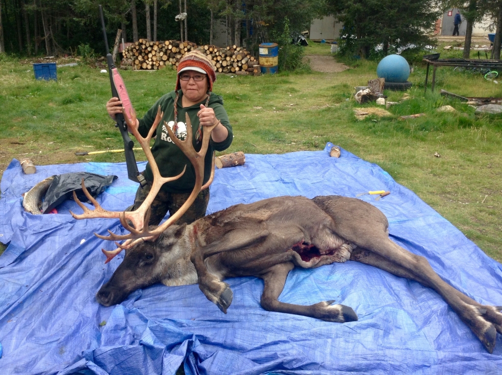 Jean Hunter harvests a bull caribou that was shot during her camping trip.