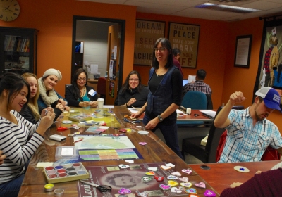 Bead-In organizer Leanna Marshall, centre, and a group of participants bead their fabric hearts during Confederation College’s Bead-In in Honour of Missing and Murdered Aboriginal Women, held during Aboriginal Awareness Week 2015.  Photo by Rick Garrick 